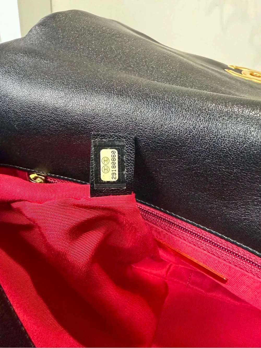 CHANEL Black Quilted Shoulder Bag with Gold Chain CC